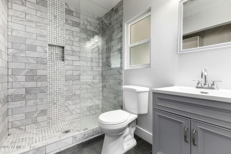 Primary Bathroom with Walk-In Closet