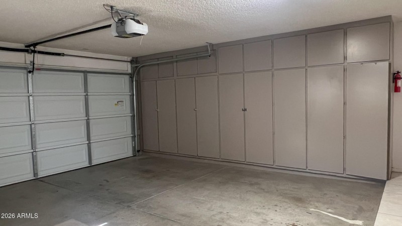 2-car garage with shelving