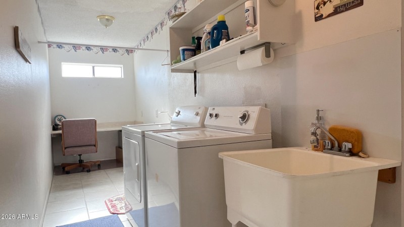 Laundry w/desk at one end.