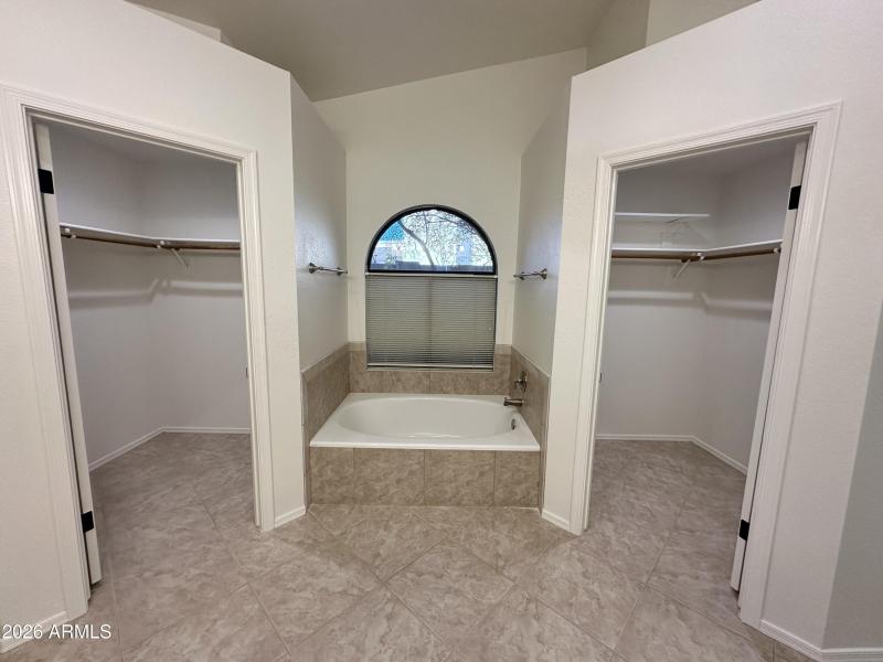 Double closets in the primary bathroom