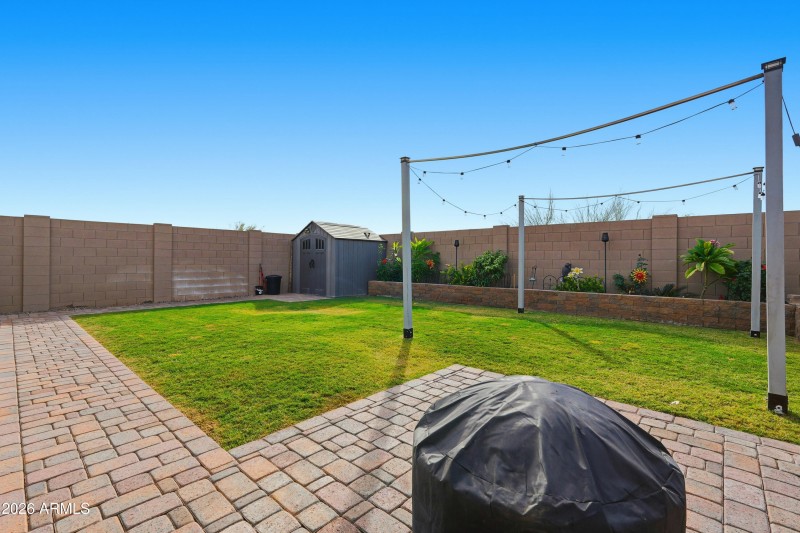 Upgraded Backyard with pavers and grass