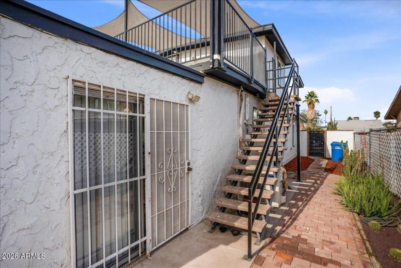 Stairs to apartment/rooftop deck