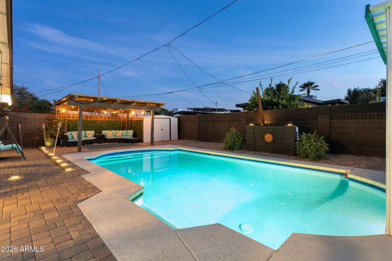 Pool surrounded by pavers