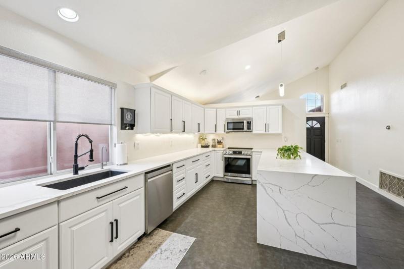 Kitchen with Waterfall Countertops