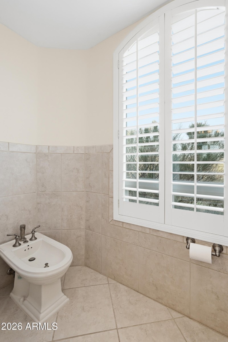 Private toilet room with bidet