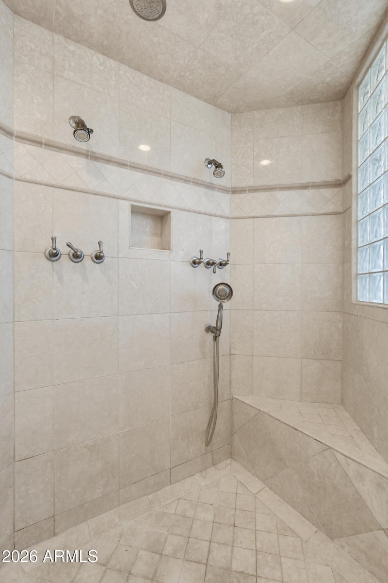 Primary shower with three shower heads