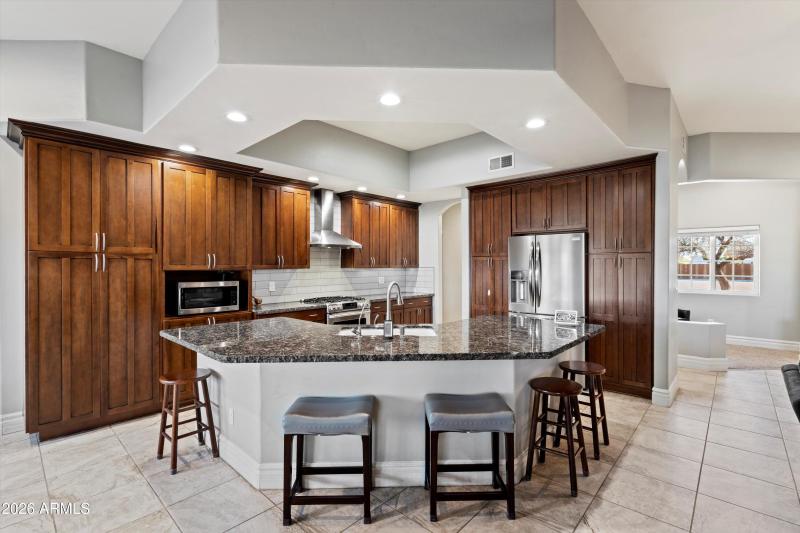 Spacious Kitchen With Granite Counters