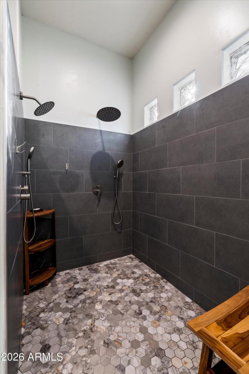 Renovated Walk-In Shower With Dual Heads