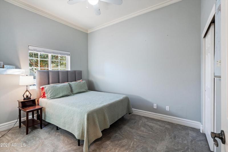 Secondary Bedroom With Tile Flooring