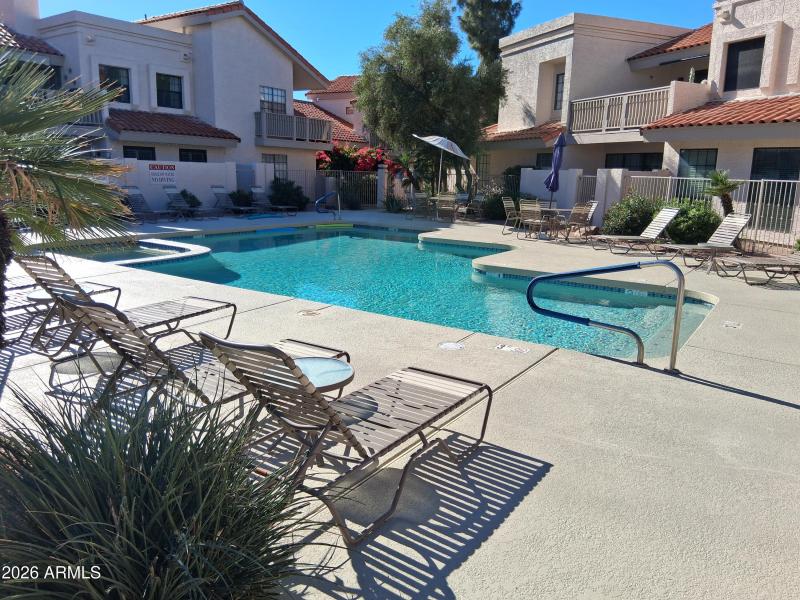 pool and spa adjacent to unit poolside
