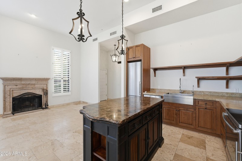 Kitchen Faces Fireplace and Views