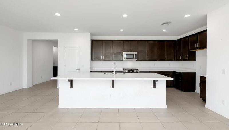 11208 S 52nd Ln-large-007-021-11208 S 52