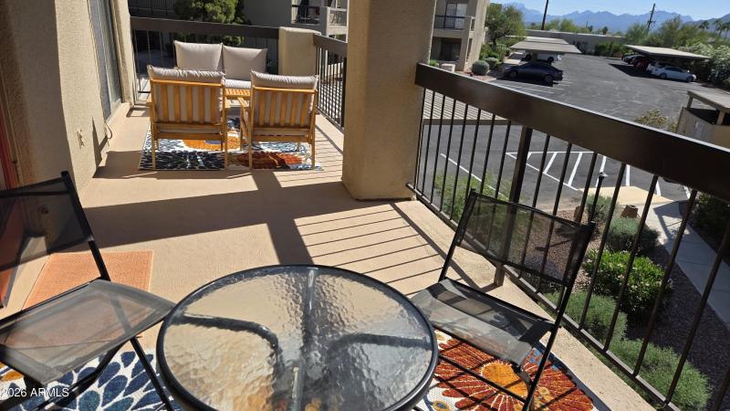 Balcony with two seating areas