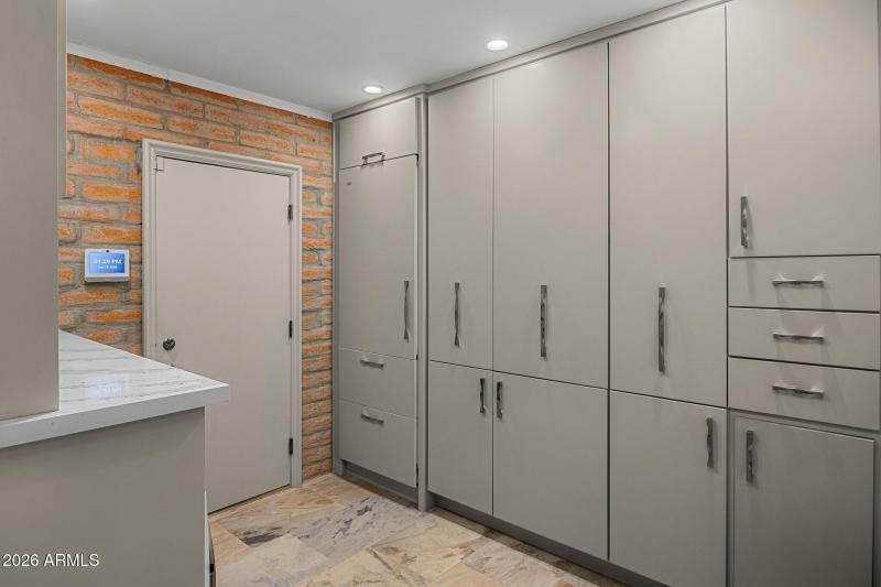 13kitchen storage and laundry