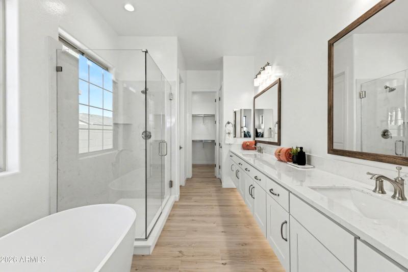 Lot 32 luxury tub and frameless shower