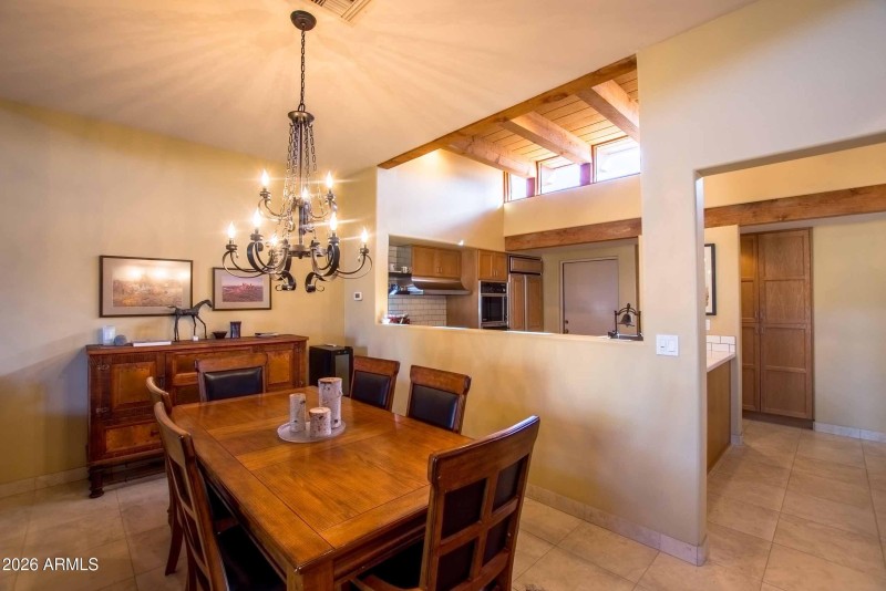 dining area with path to the kitchen
