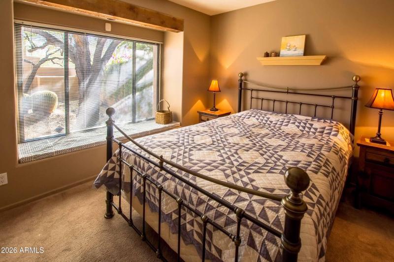 guest bedroom with adjacent bath