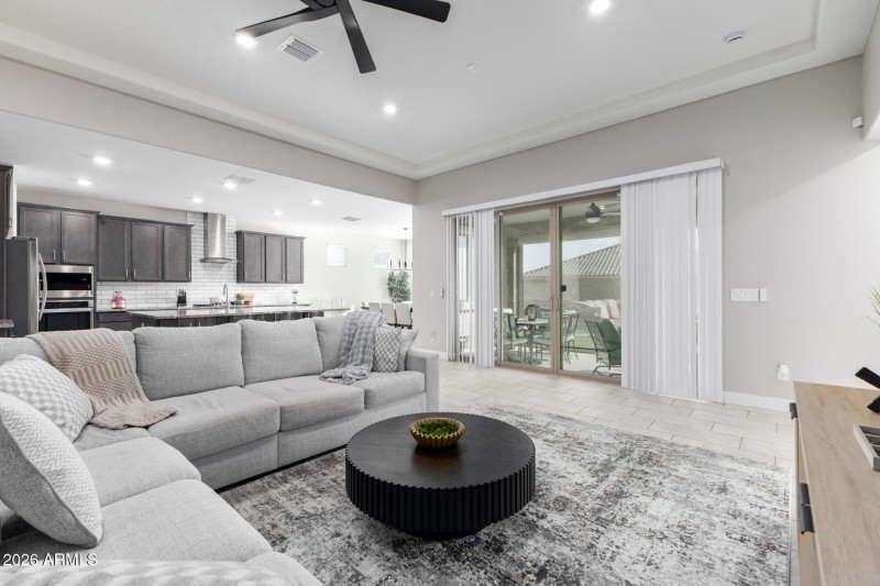 Open great room with ceiling fan