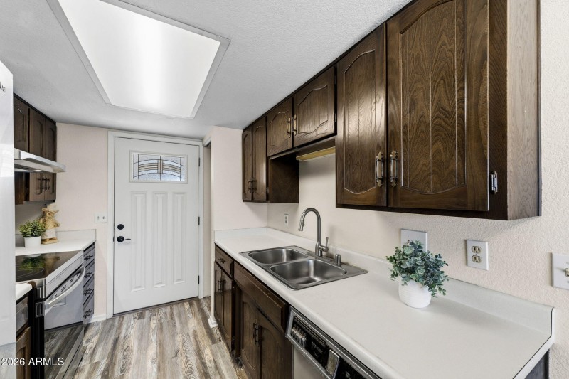 Kitchen with new sink and faucet