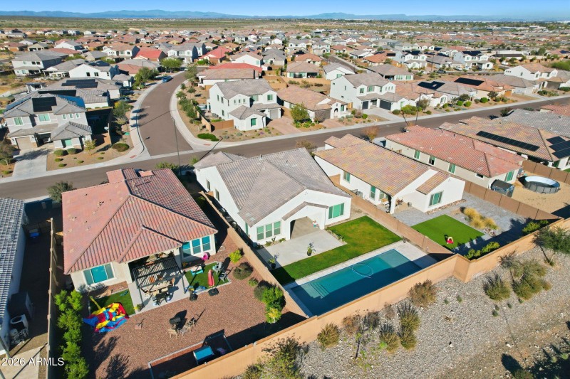 Private backyard living, backs to wash