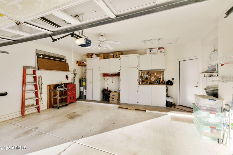 Garage with cabinets/workbench