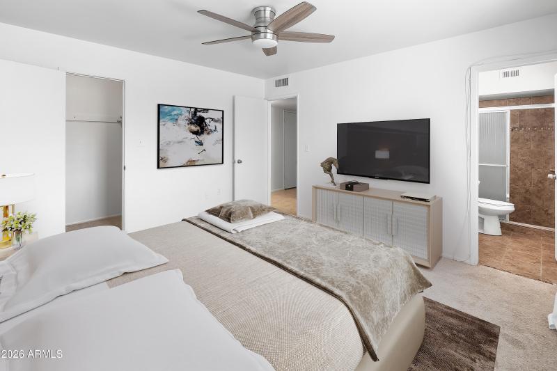 Primary bedroom and bathroom