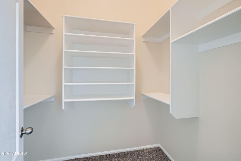 Primary walk-in closet