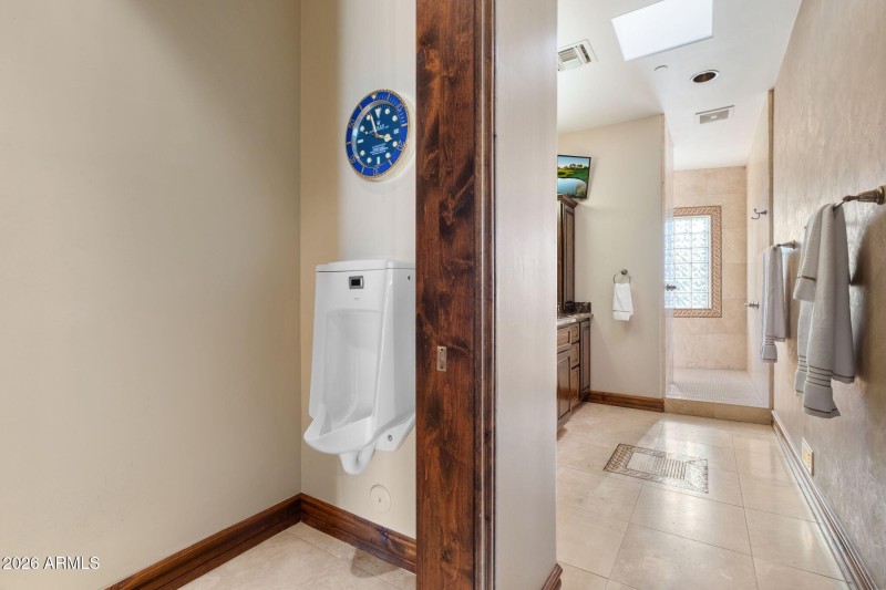 Primary Bathroom (His)