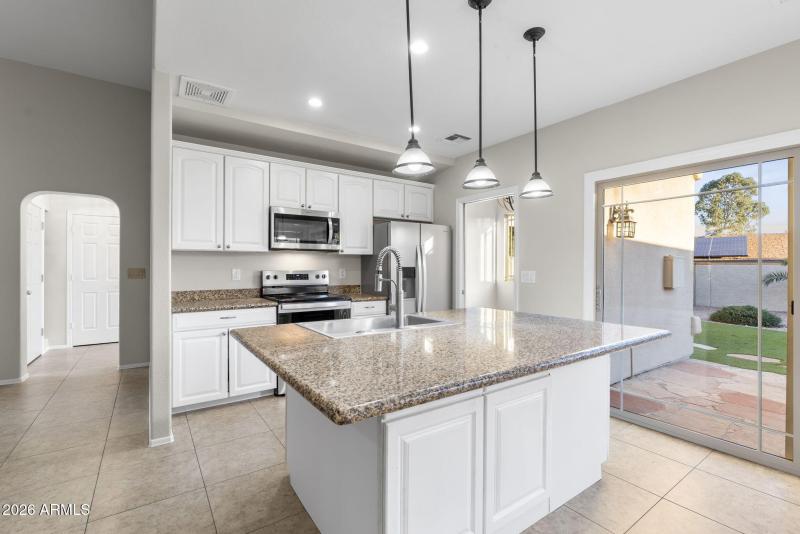 Kitchen Opens to Family Room