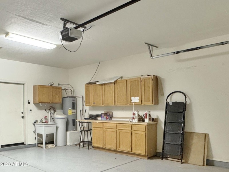 Water sofetener/ cabinets in garage