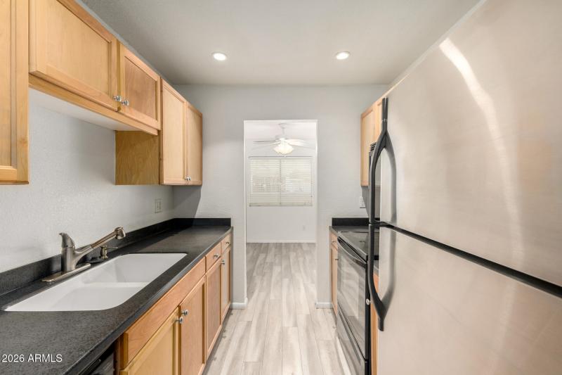 Galley Kitchen with Granite