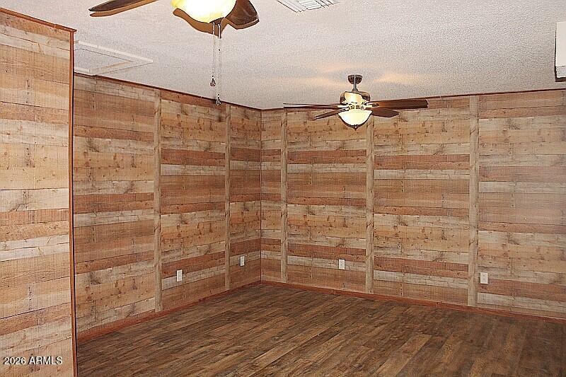 Primary bedroom wood walls