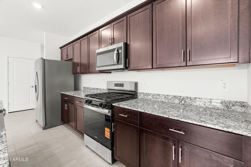 SS Appliances + Granite Countertops