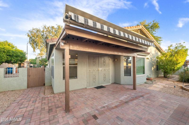 Backyard patio with electric shade
