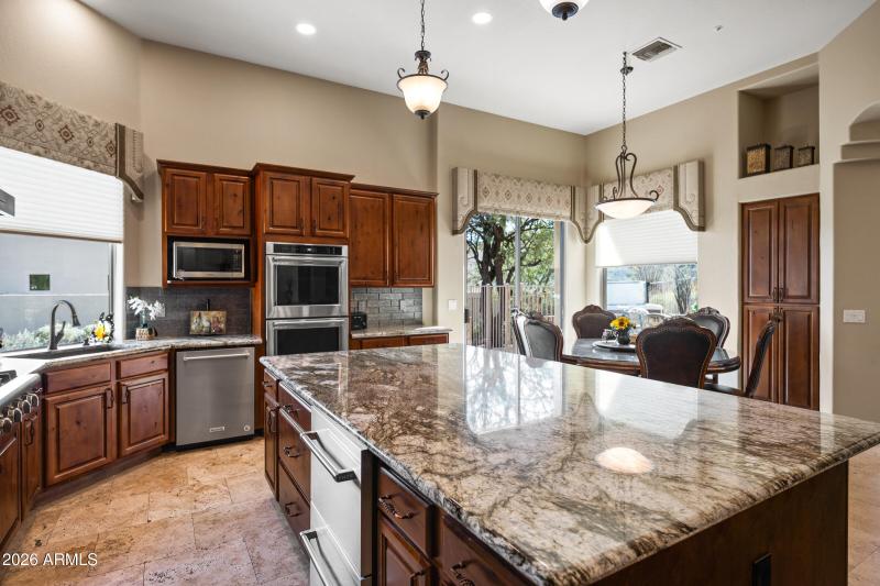 Granite slab island w/refrig drawers