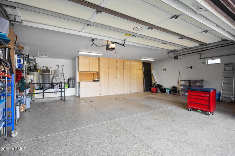 3 car garage with built in cabinets