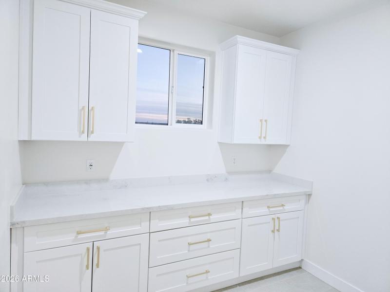 Extra spacious Laundry Room w. Cabinetry