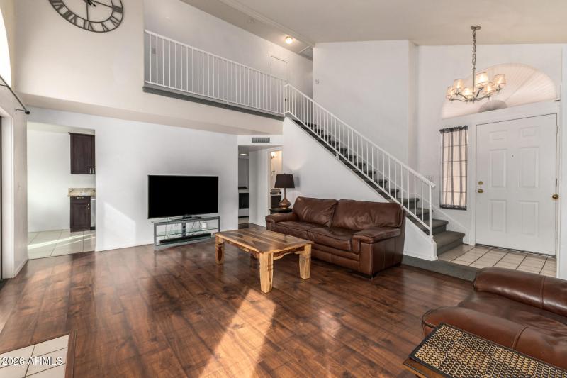 Living Room w/tons of light & Fireplace!