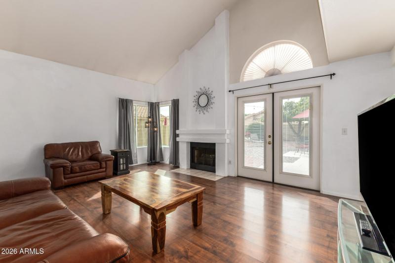Living Room w/tons of light & Fireplace!