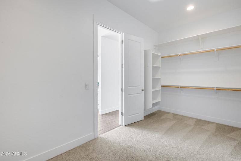 Primary closet with laundry access