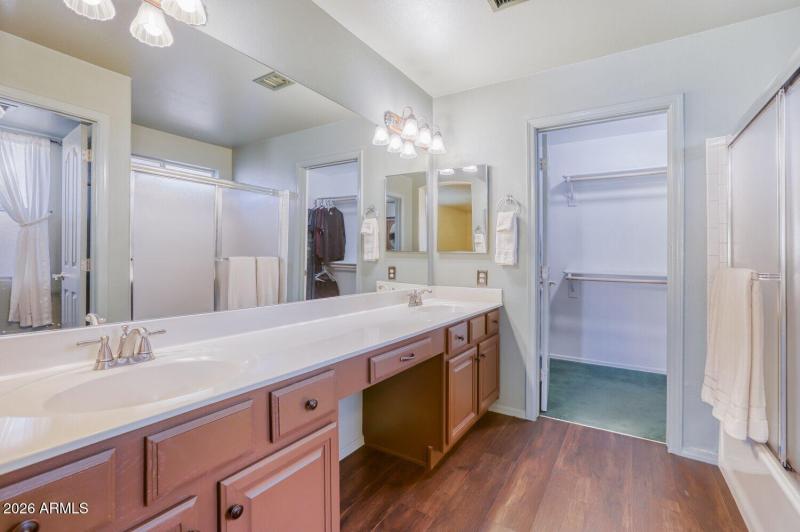 Primary bath featuring double sinks