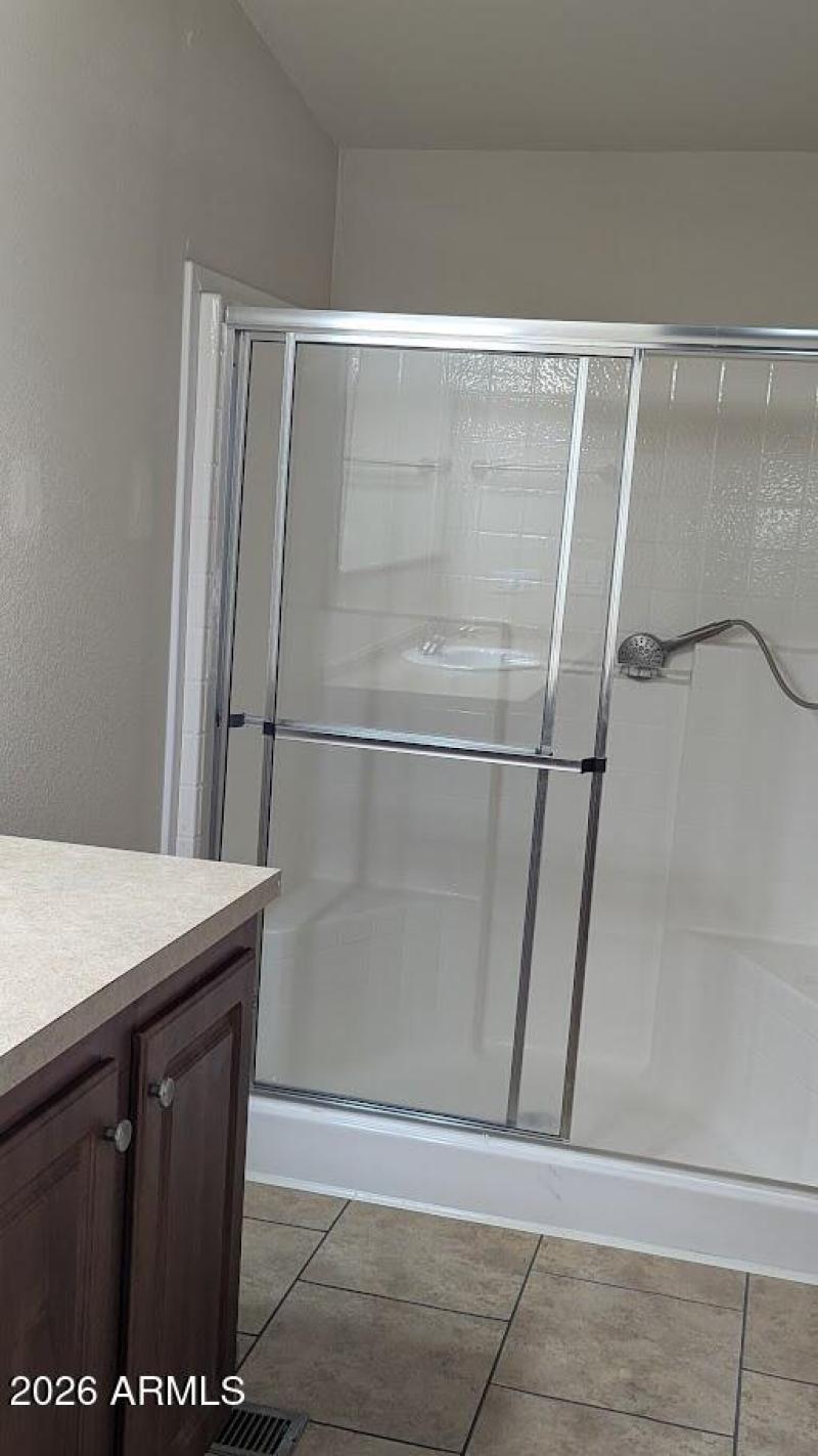 Shower in primary bedroom