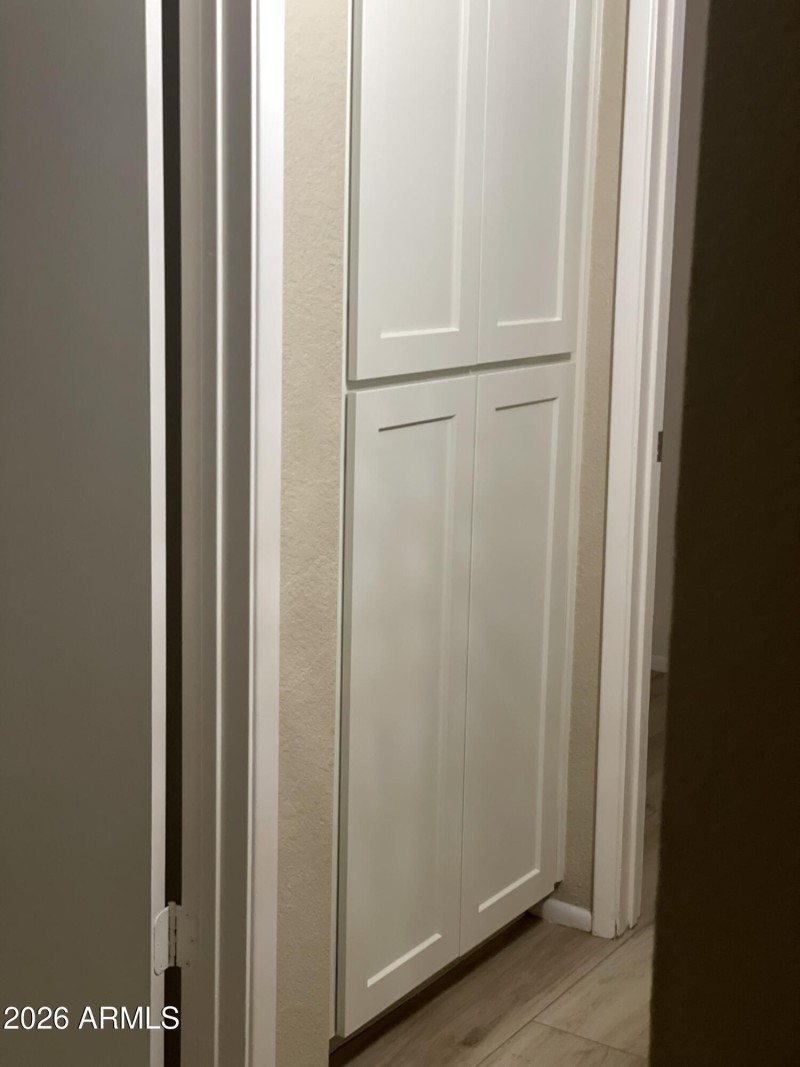 one of two linen closets