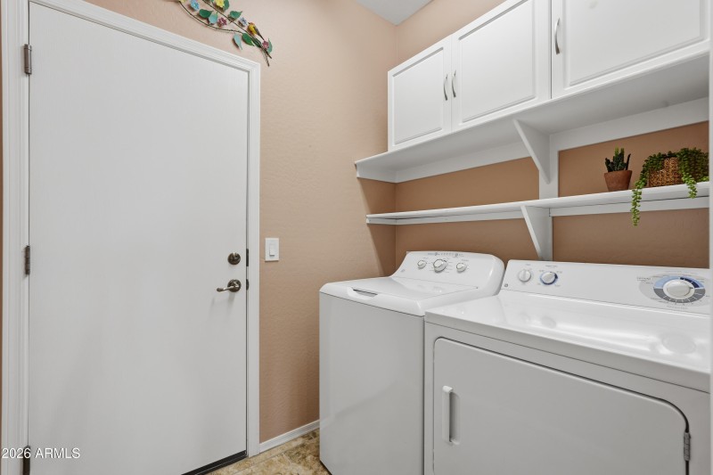 Laundry with Cabinets & Shelving