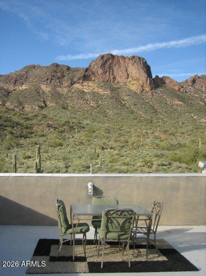 5561 upstairs patio glass table and 4 ch