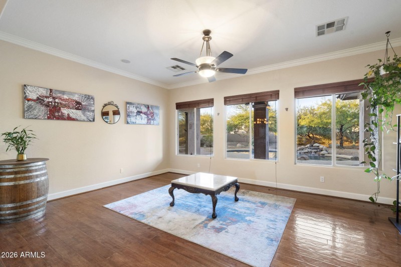 Spacious Living Area w Wood Flooring