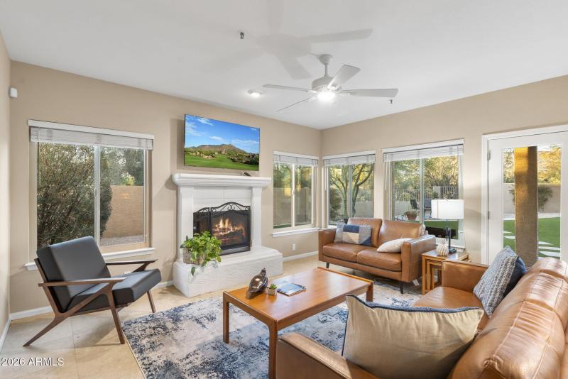 Wood-burning fireplace in family room