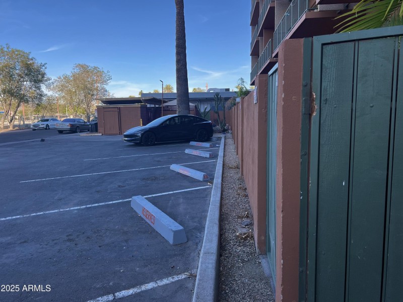 Landmark Reserve parking in back of cond