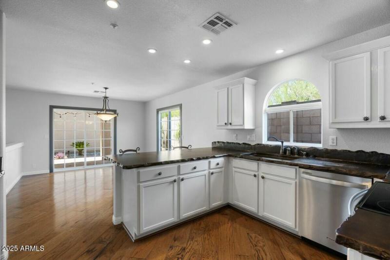Kitchen with view of dining room