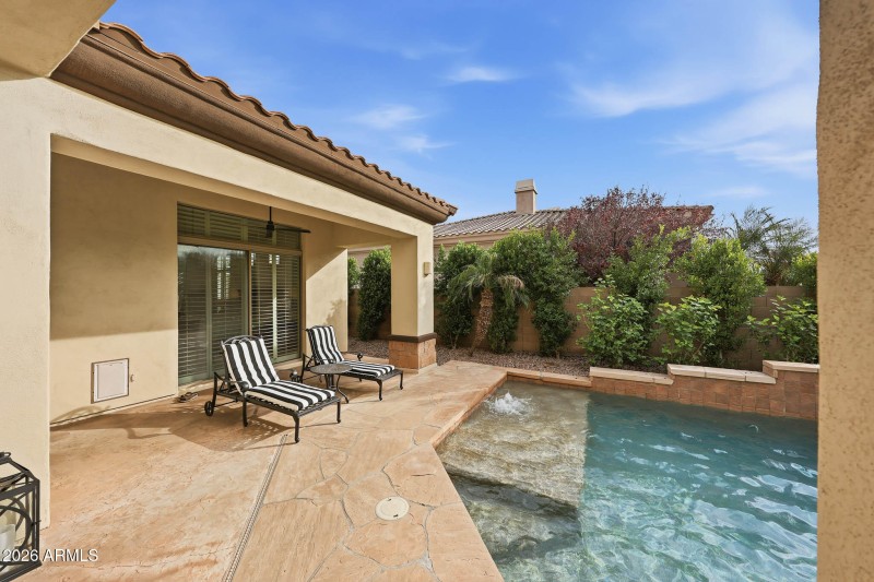 Covered patio off primary suite